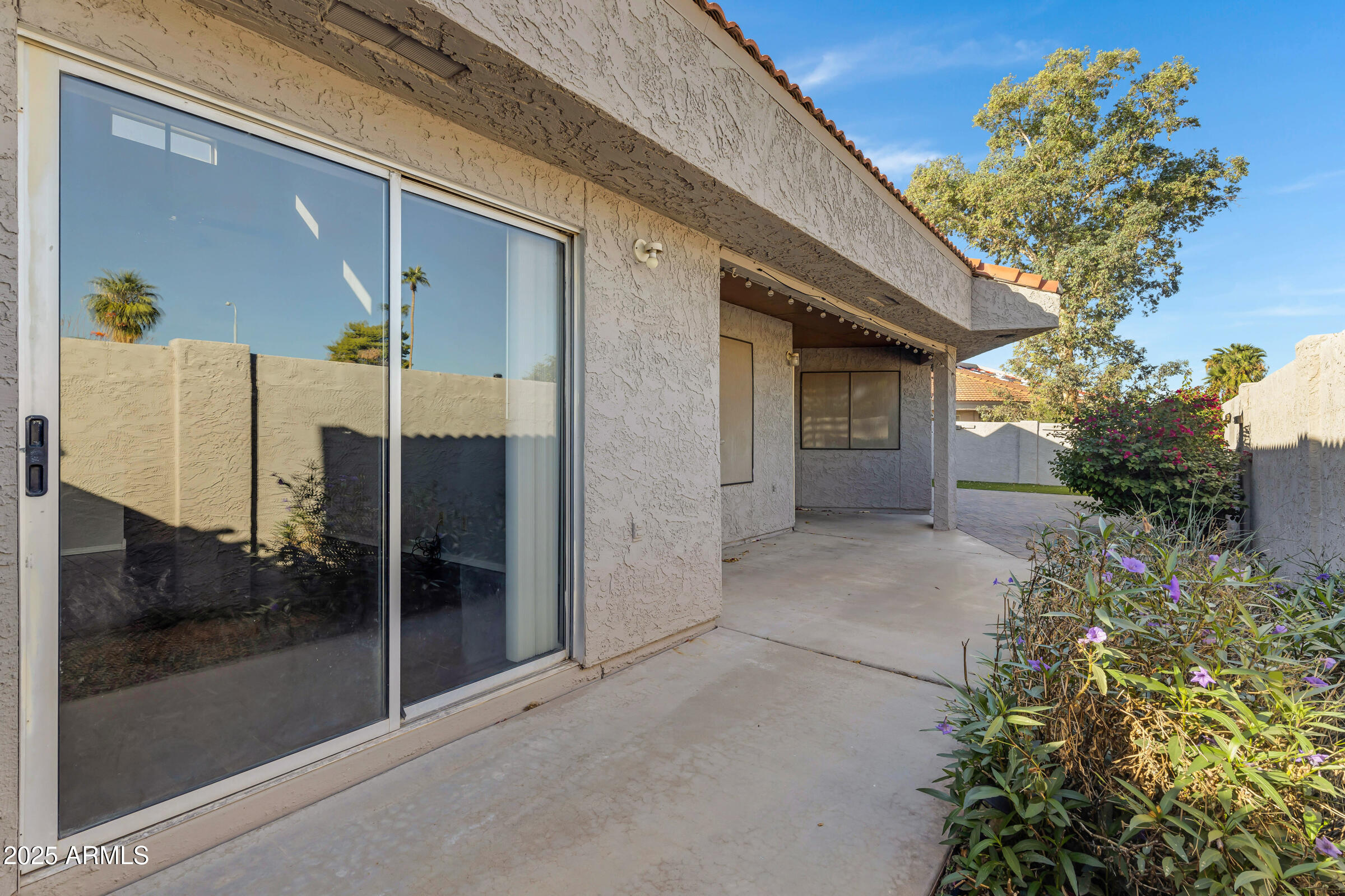 792 West El Monte Place, Unit 8 Chandler, AZ 85225 - Photo 33 of 33 a view of a door and an outdoor space