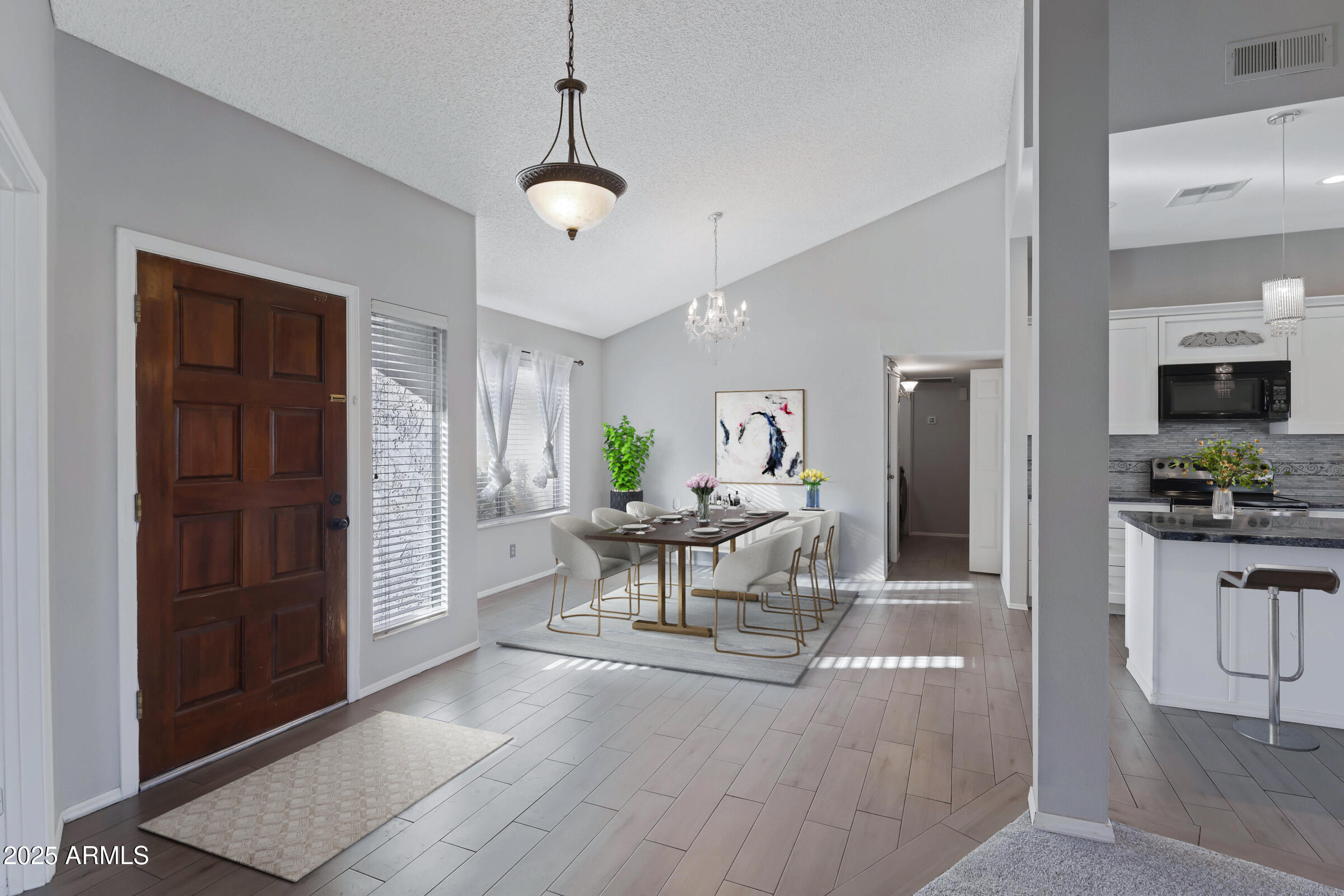 792 West El Monte Place, Unit 8 Chandler, AZ 85225 - Photo 4 of 33 a view of a livingroom with furniture fire place and a window
