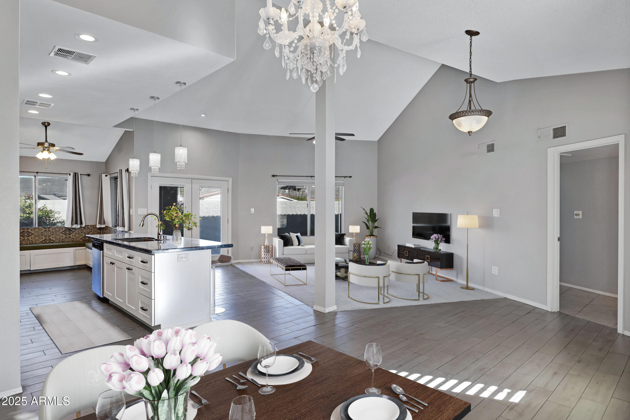 792 West El Monte Place, Unit 8 Chandler, AZ 85225 - Photo 6 of 33 a large kitchen with a table and chairs