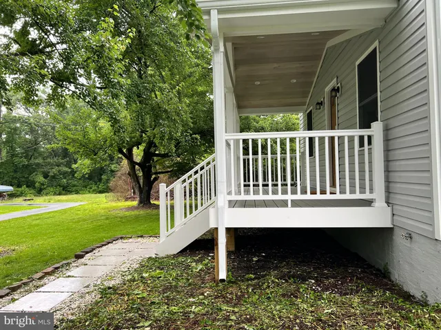 a view of a yard with an ocean view
