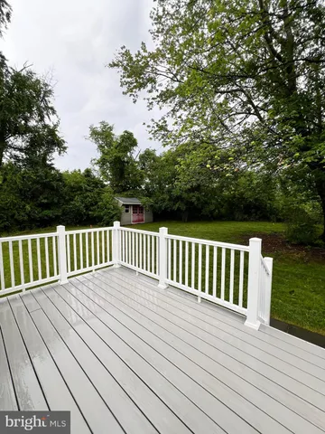 a view of backyard with green space