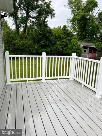 a view of a wooden fence