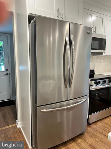 a view with granite countertop a sink