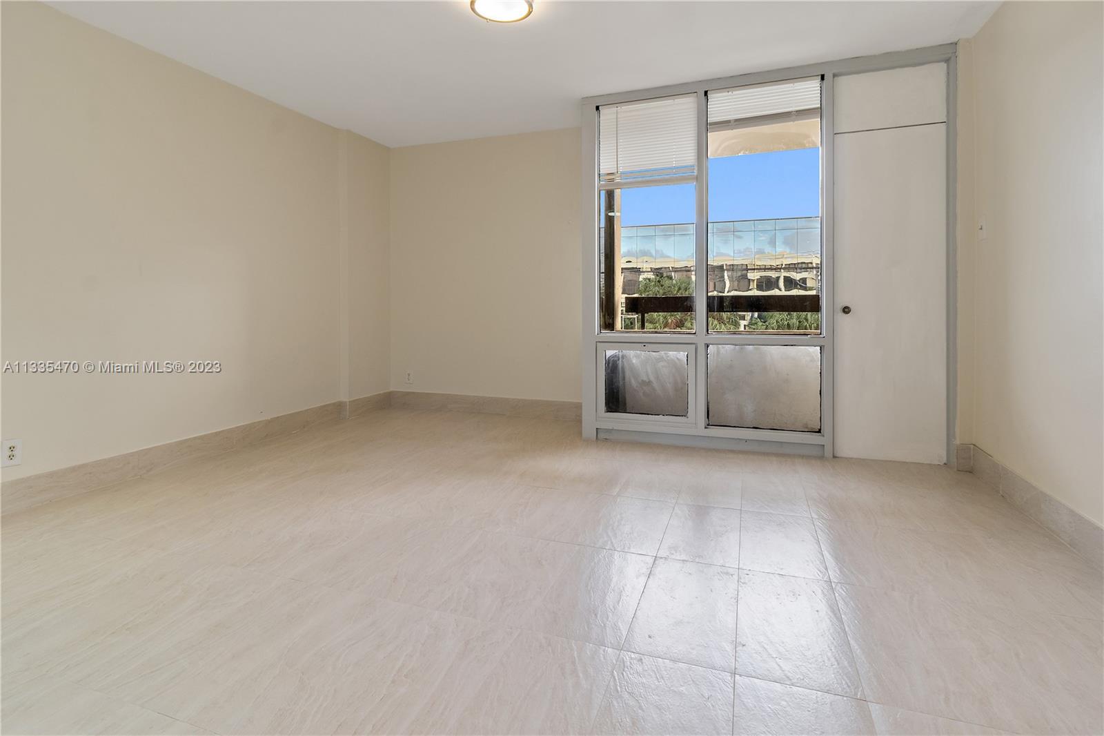 1401 South Federal Highway, Unit 204 Boca Raton, FL 33432 - Photo 12 of 22 an empty room with a fireplace