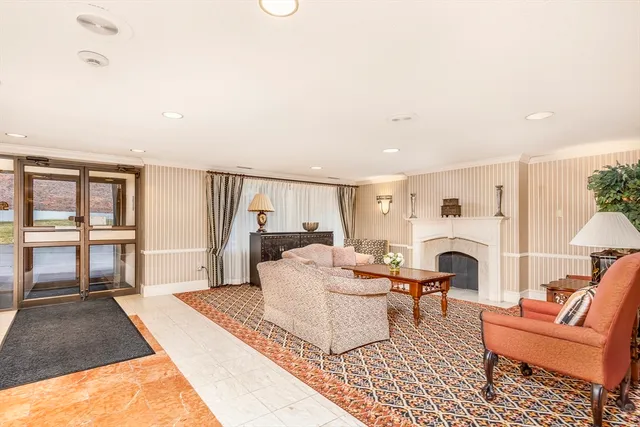 a kitchen with stainless steel appliances granite countertop a refrigerator sink and stove