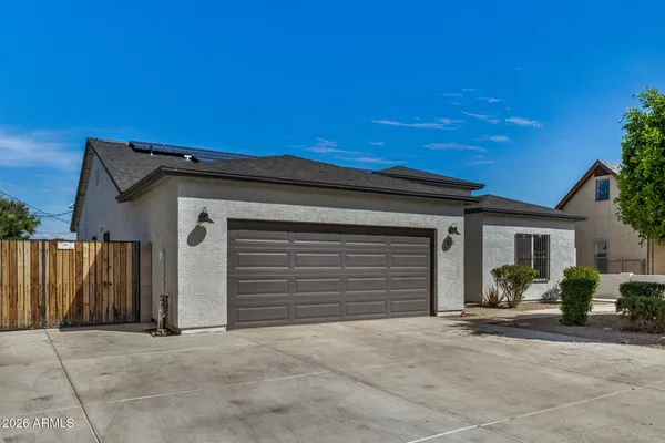 a view of garage with a outdoor space