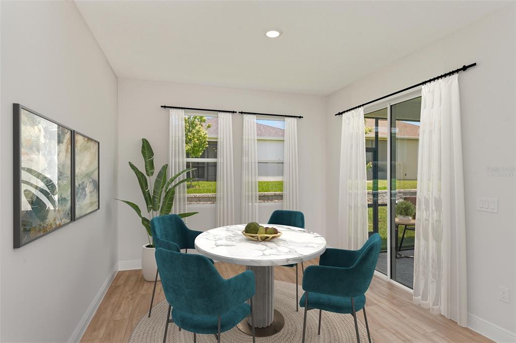 6236 Southwest 97th Street Ocala, FL 34476 - Photo 20 of 31 a view of a dining room with furniture window and wooden floor