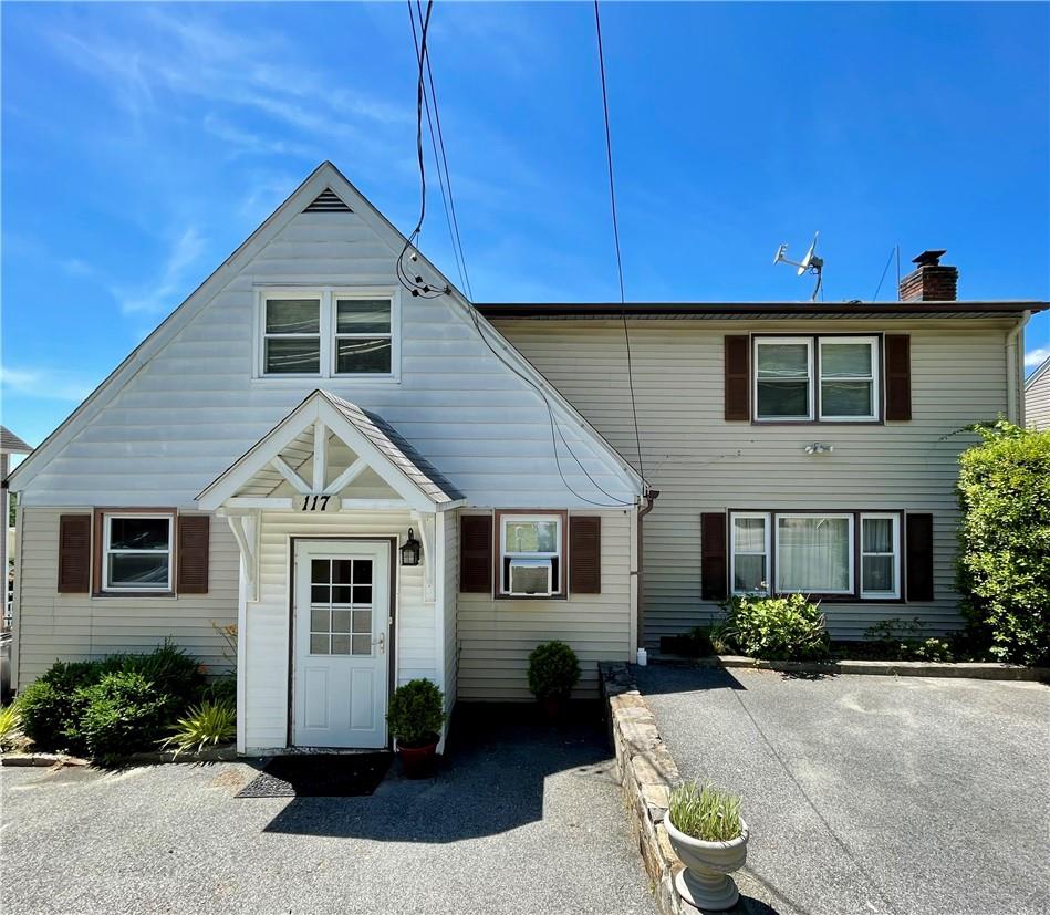 117 Lakeview Avenue Valhalla, NY 10595 - Photo 1 of 1 a front view of a house with a yard