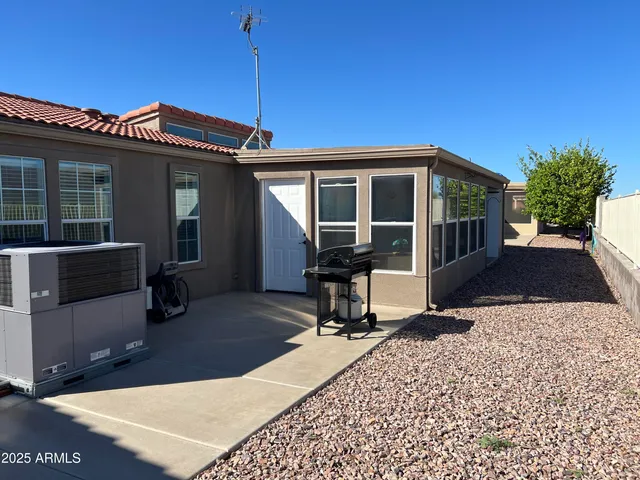 a view of a house with a patio