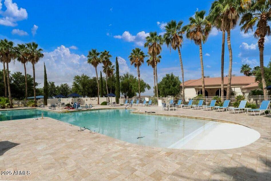 3301 South Goldfield Road, Unit 5078 Apache Junction, AZ 85119 - Photo 39 of 46 a view of swimming pool and lake view