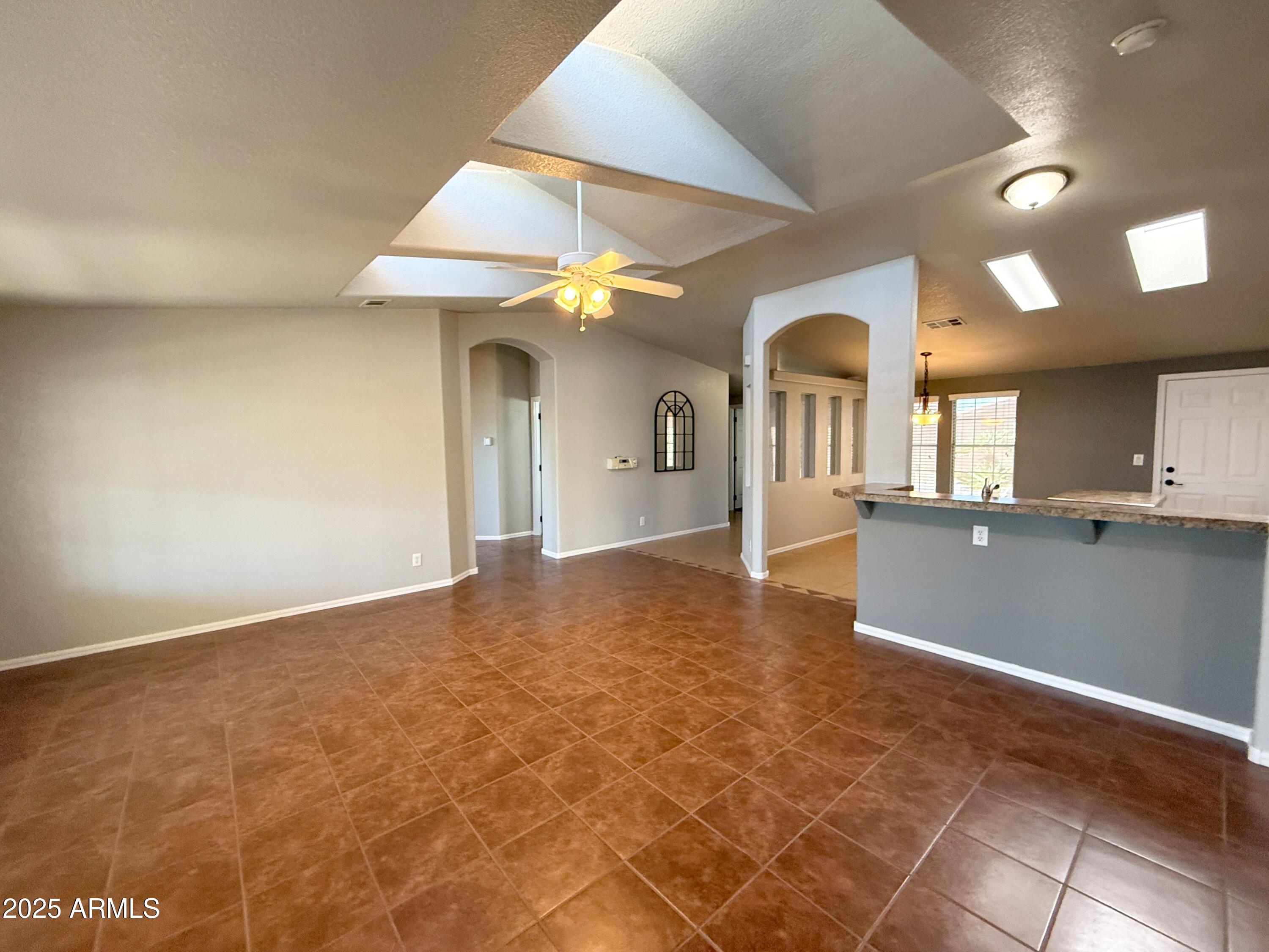 3301 South Goldfield Road, Unit 5078 Apache Junction, AZ 85119 - Photo 4 of 46 a view of a kitchen with a sink