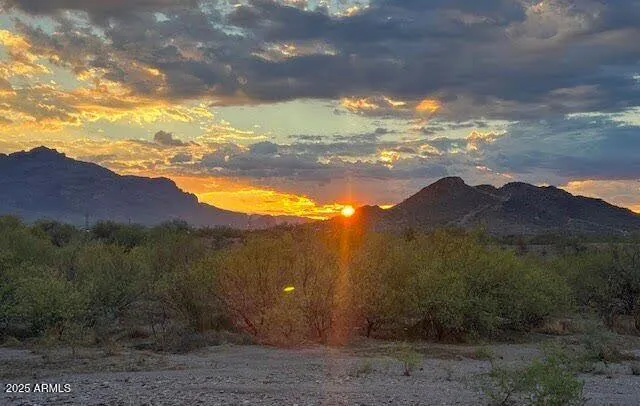 a view of an outdoor space and mountain view