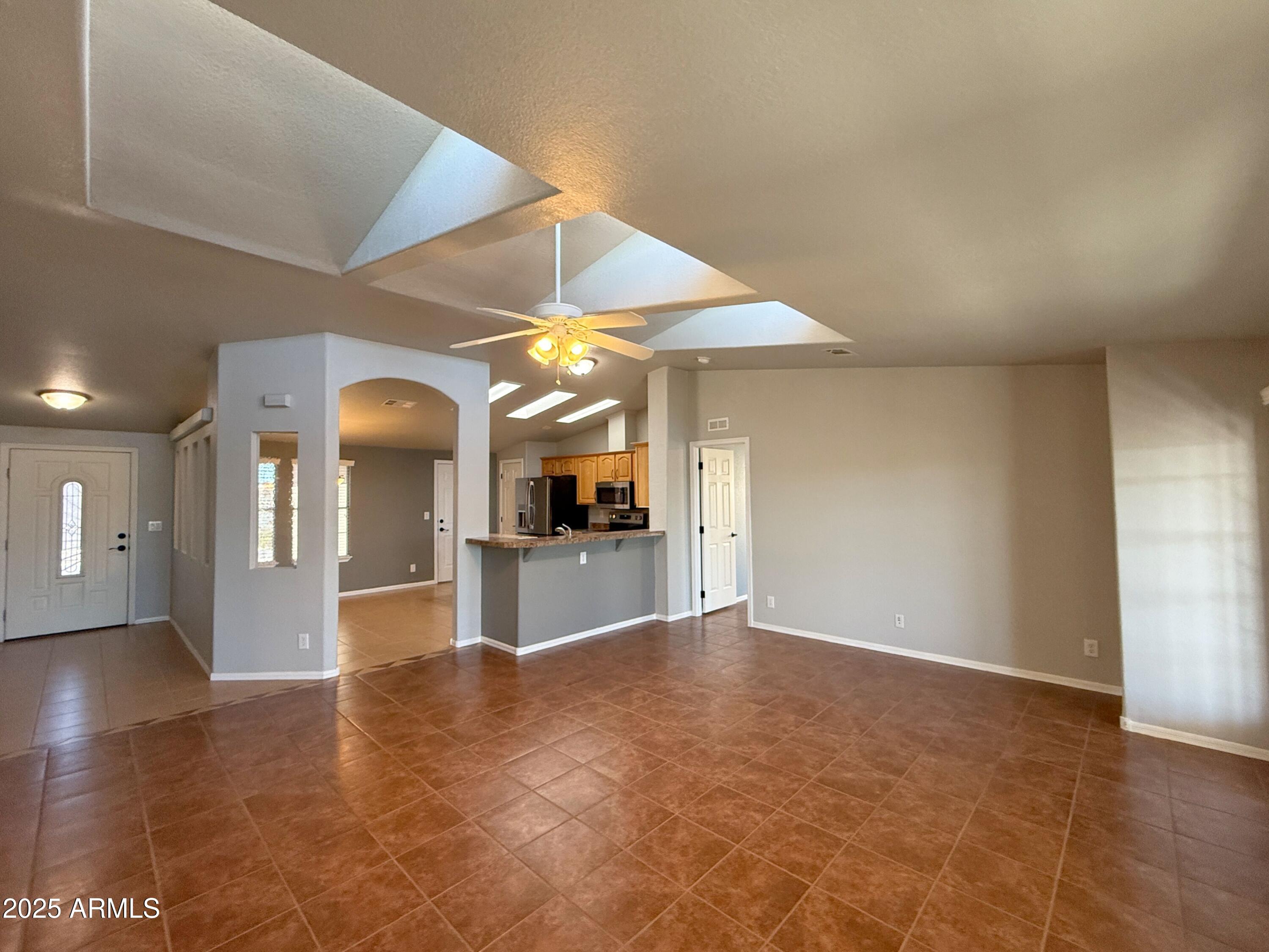 3301 South Goldfield Road, Unit 5078 Apache Junction, AZ 85119 - Photo 5 of 46 a view of a livingroom with a furniture