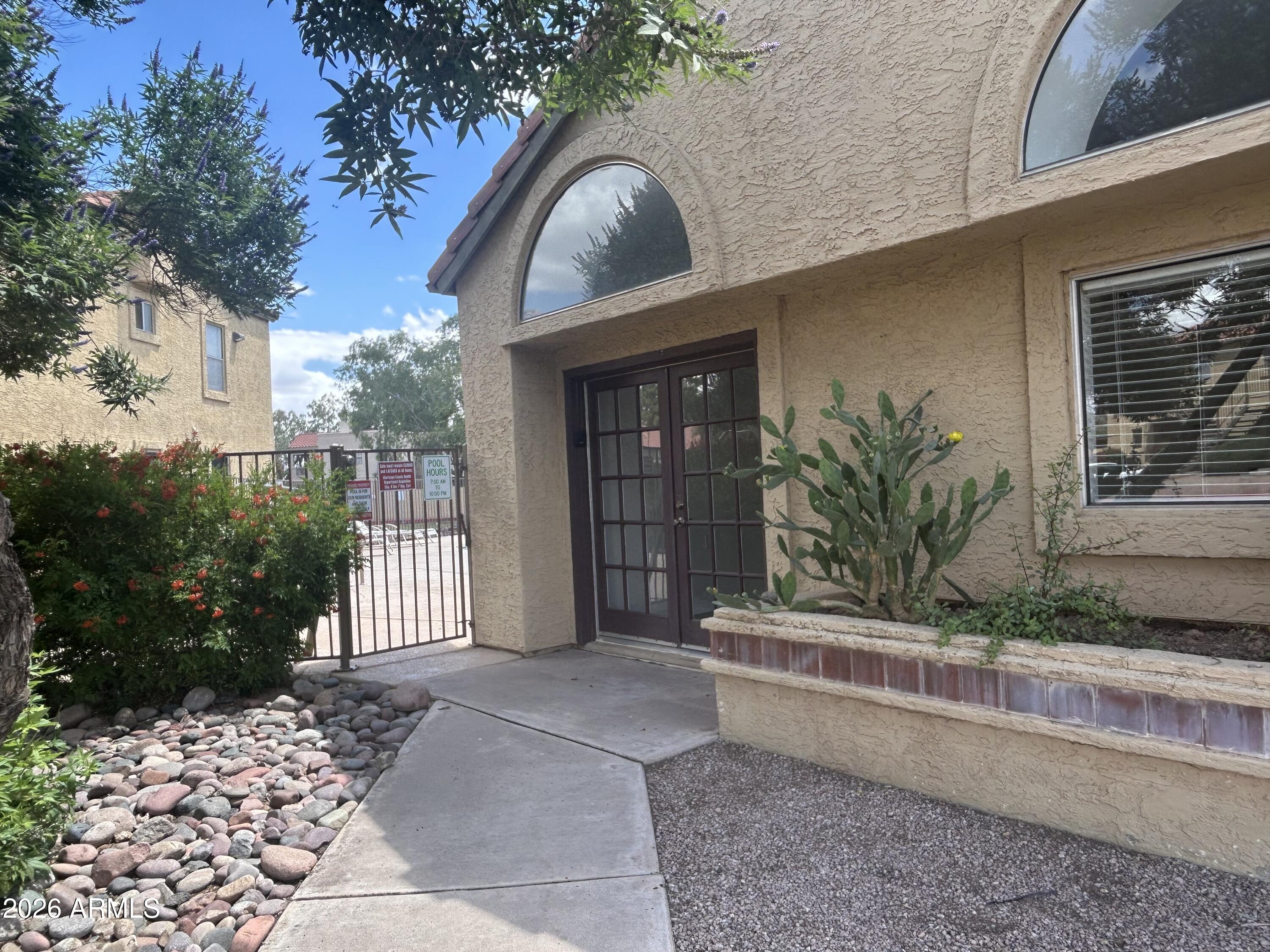 653 West Guadalupe Road, Unit 2116 Mesa, AZ 85210 - Photo 31 of 40 pool Entry and clubhouse