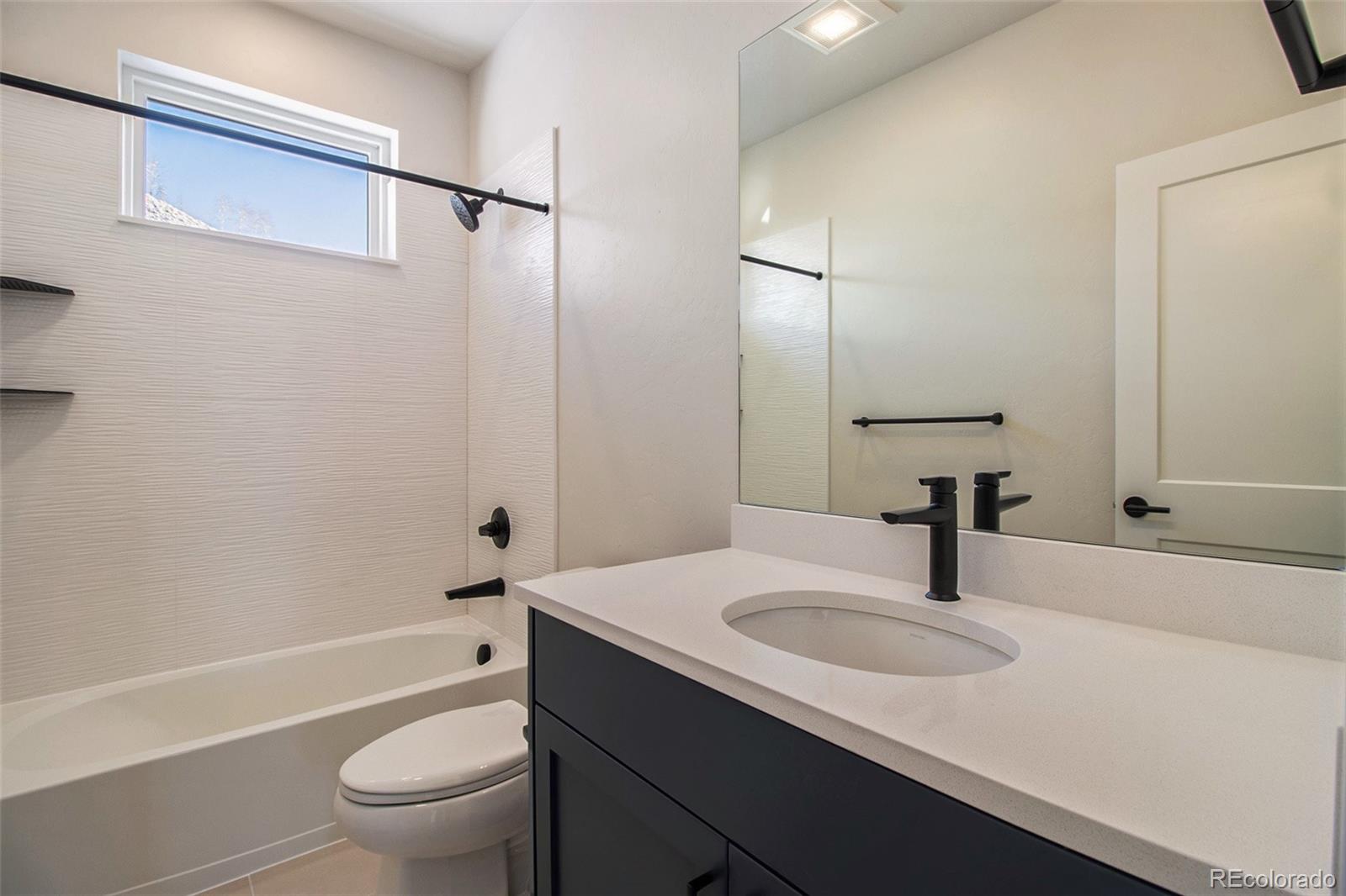 98 High Grove Loop Winter Park, CO 80482 - Photo 17 of 24 a bathroom with a sink toilet and shower