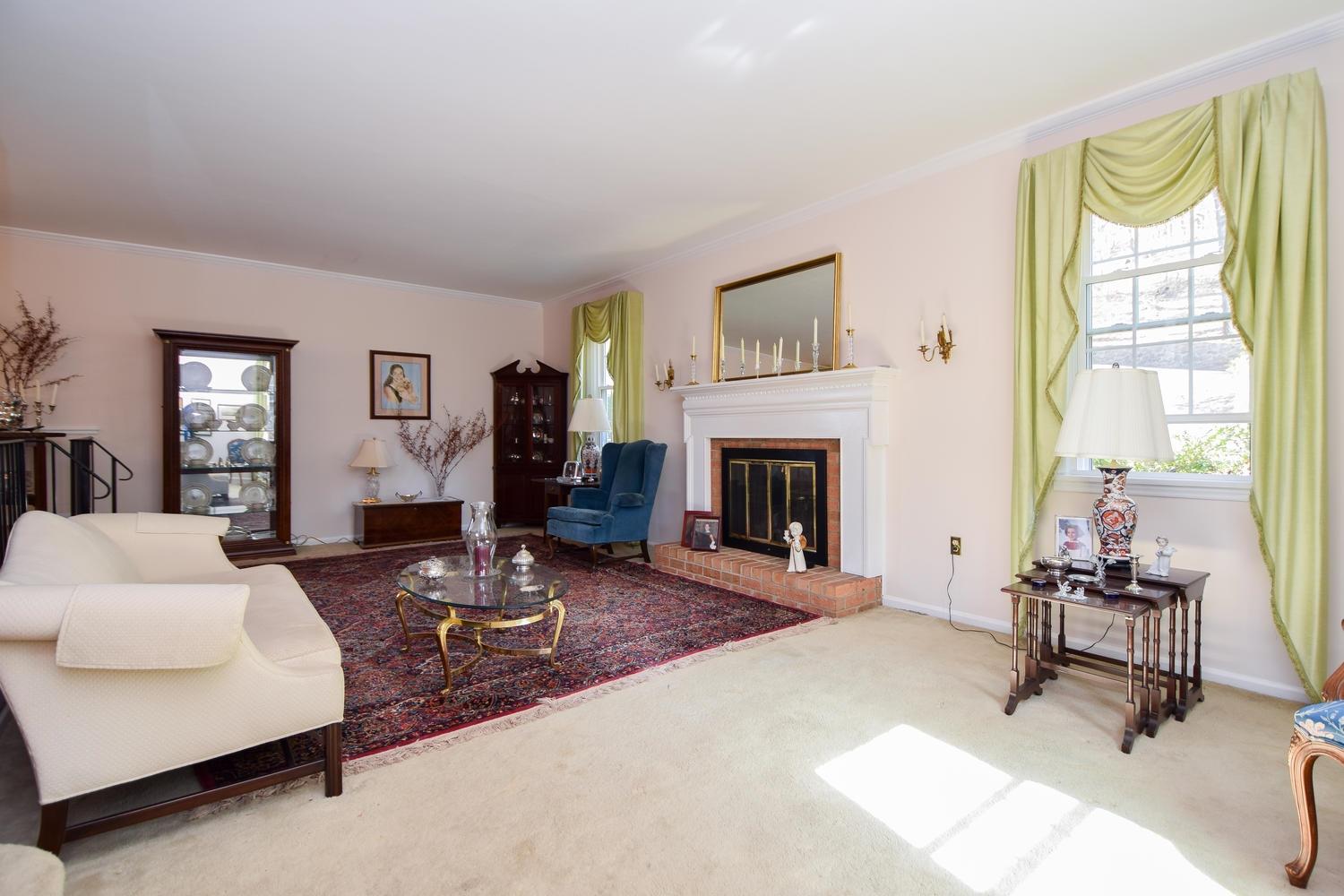 5222 Falcon Ridge Road Roanoke, VA 24018 - Photo 2 of 40 a living room with furniture and a fireplace