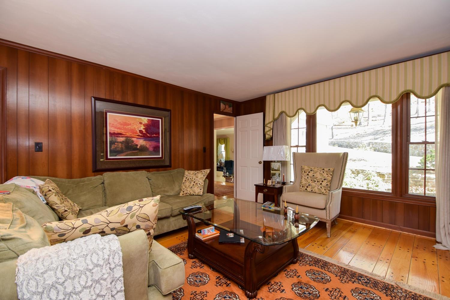 5222 Falcon Ridge Road Roanoke, VA 24018 - Photo 13 of 40 a living room with furniture and a floor to ceiling window