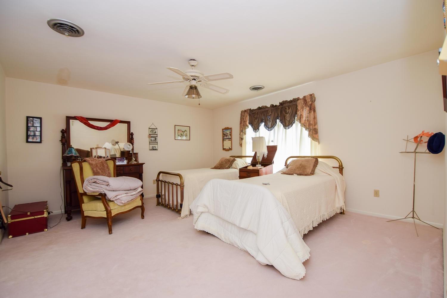5222 Falcon Ridge Road Roanoke, VA 24018 - Photo 20 of 40 a bed room with bed and window