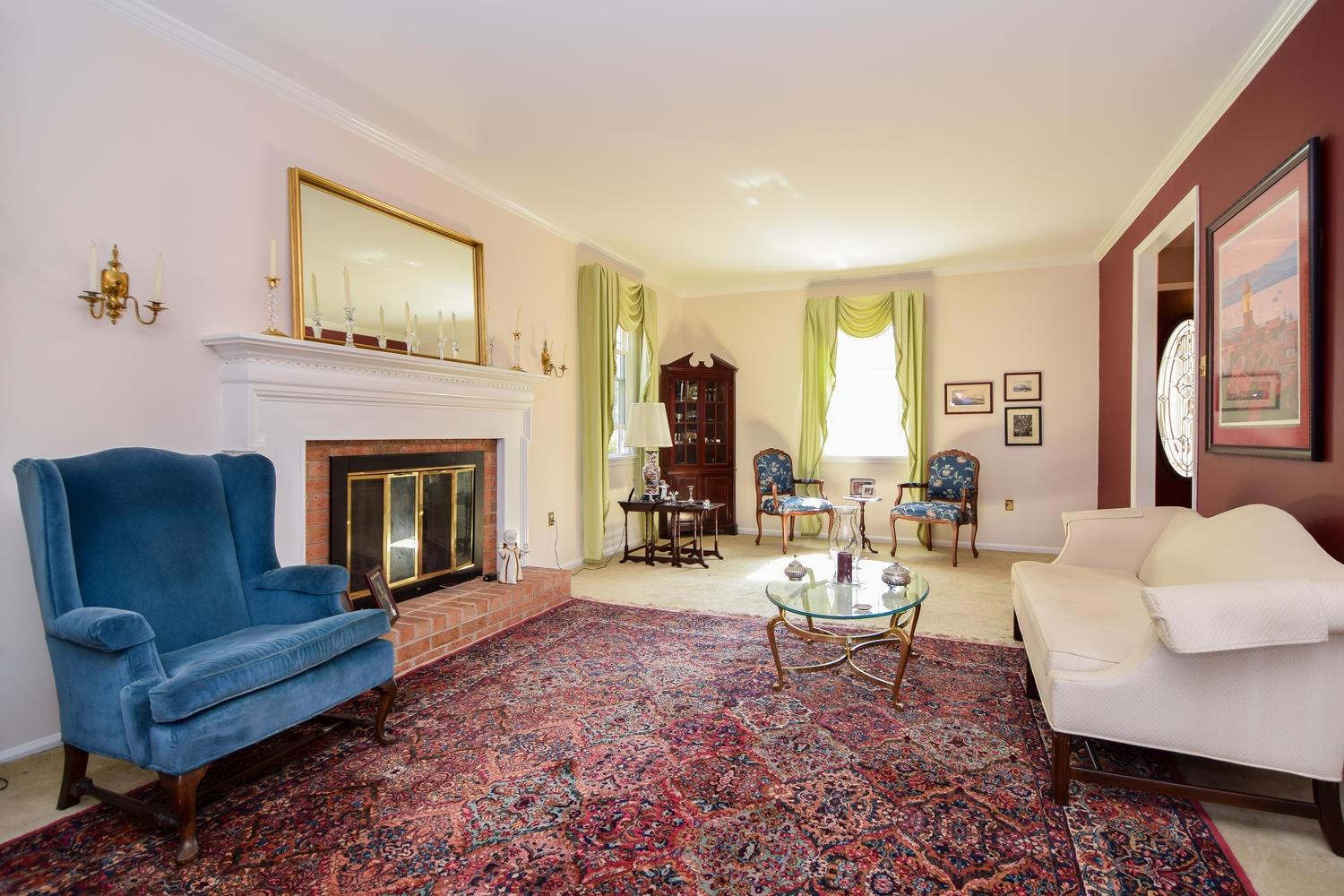 5222 Falcon Ridge Road Roanoke, VA 24018 - Photo 3 of 40 a living room with furniture and a fireplace