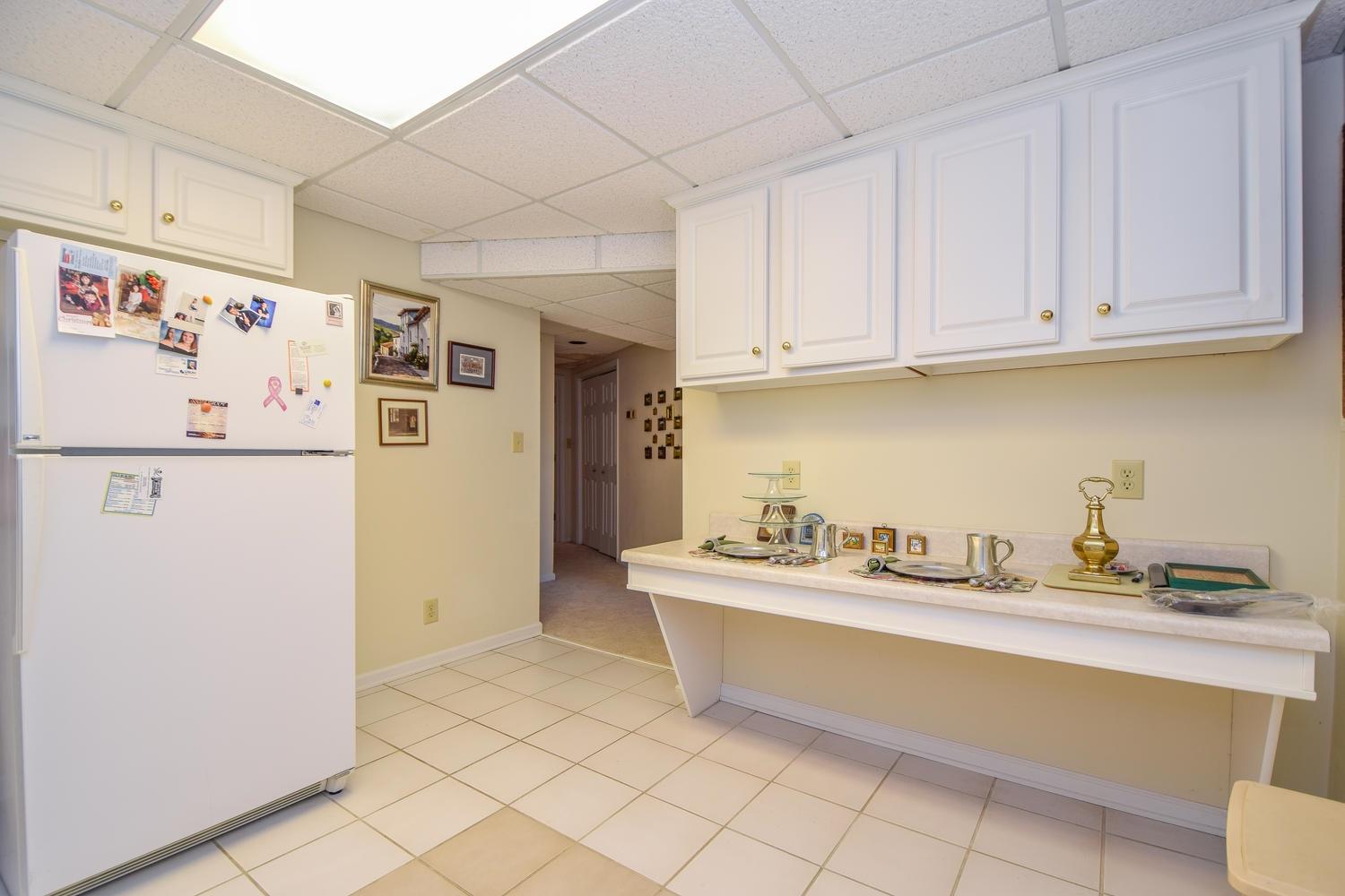 5222 Falcon Ridge Road Roanoke, VA 24018 - Photo 28 of 40 a kitchen with stainless steel appliances a refrigerator sink and cabinets