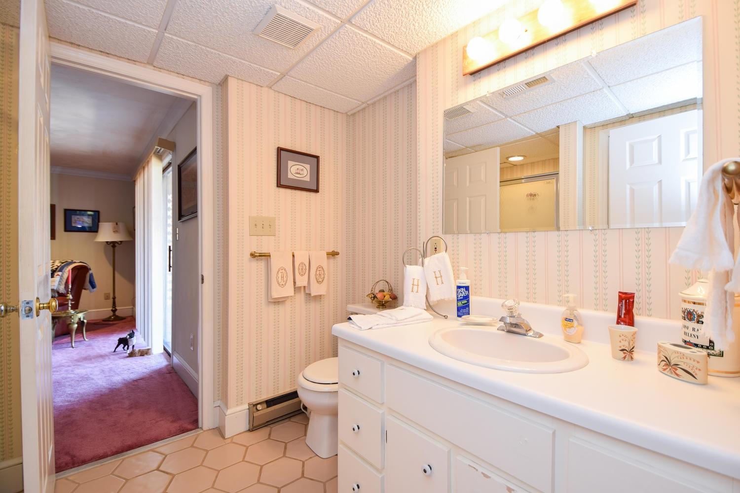 5222 Falcon Ridge Road Roanoke, VA 24018 - Photo 30 of 40 a bathroom with a sink toilet and shower