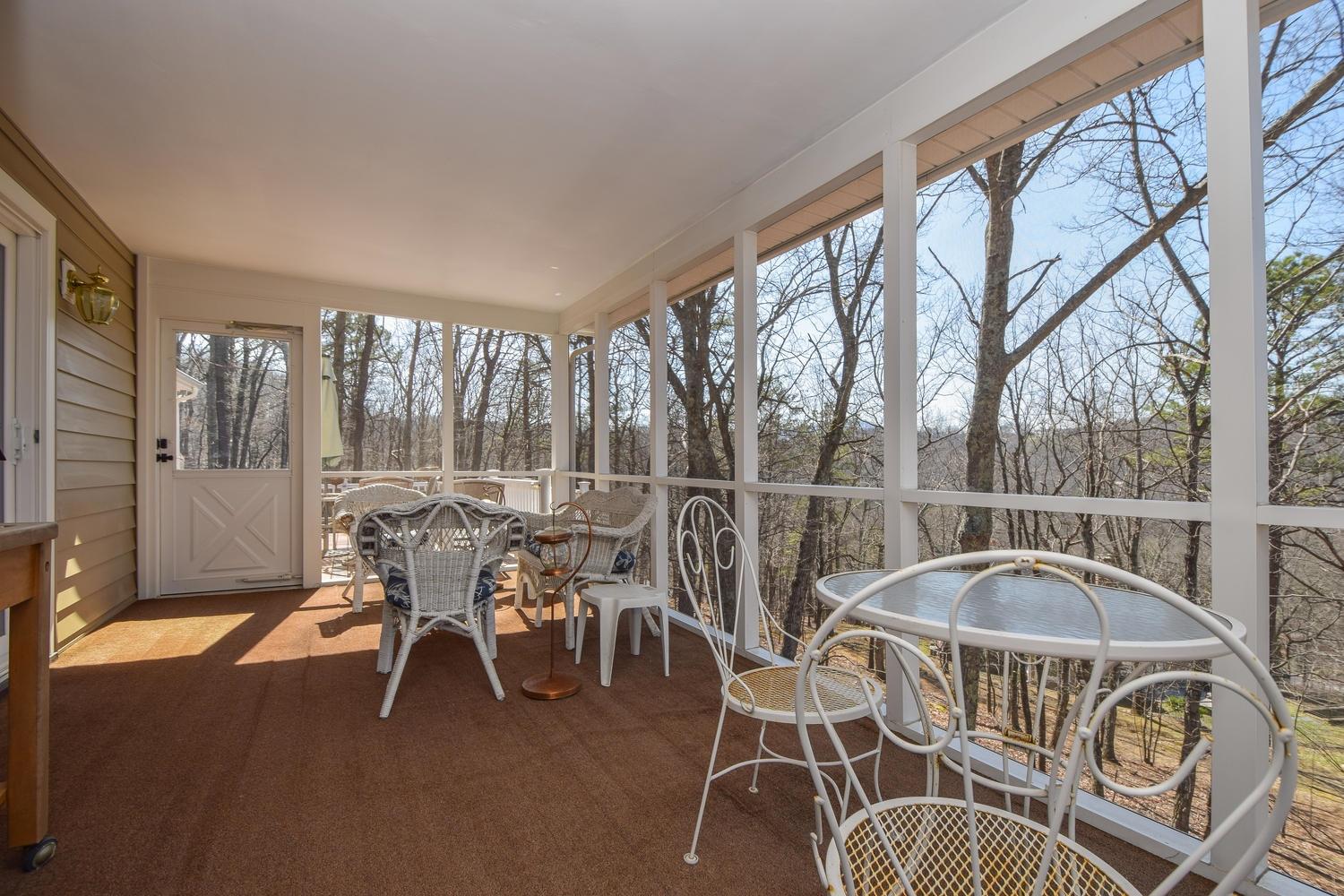 5222 Falcon Ridge Road Roanoke, VA 24018 - Photo 31 of 40 a view of a patio with table and chairs