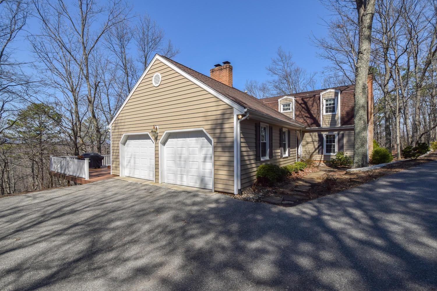 5222 Falcon Ridge Road Roanoke, VA 24018 - Photo 33 of 40 a view of a house with a yard