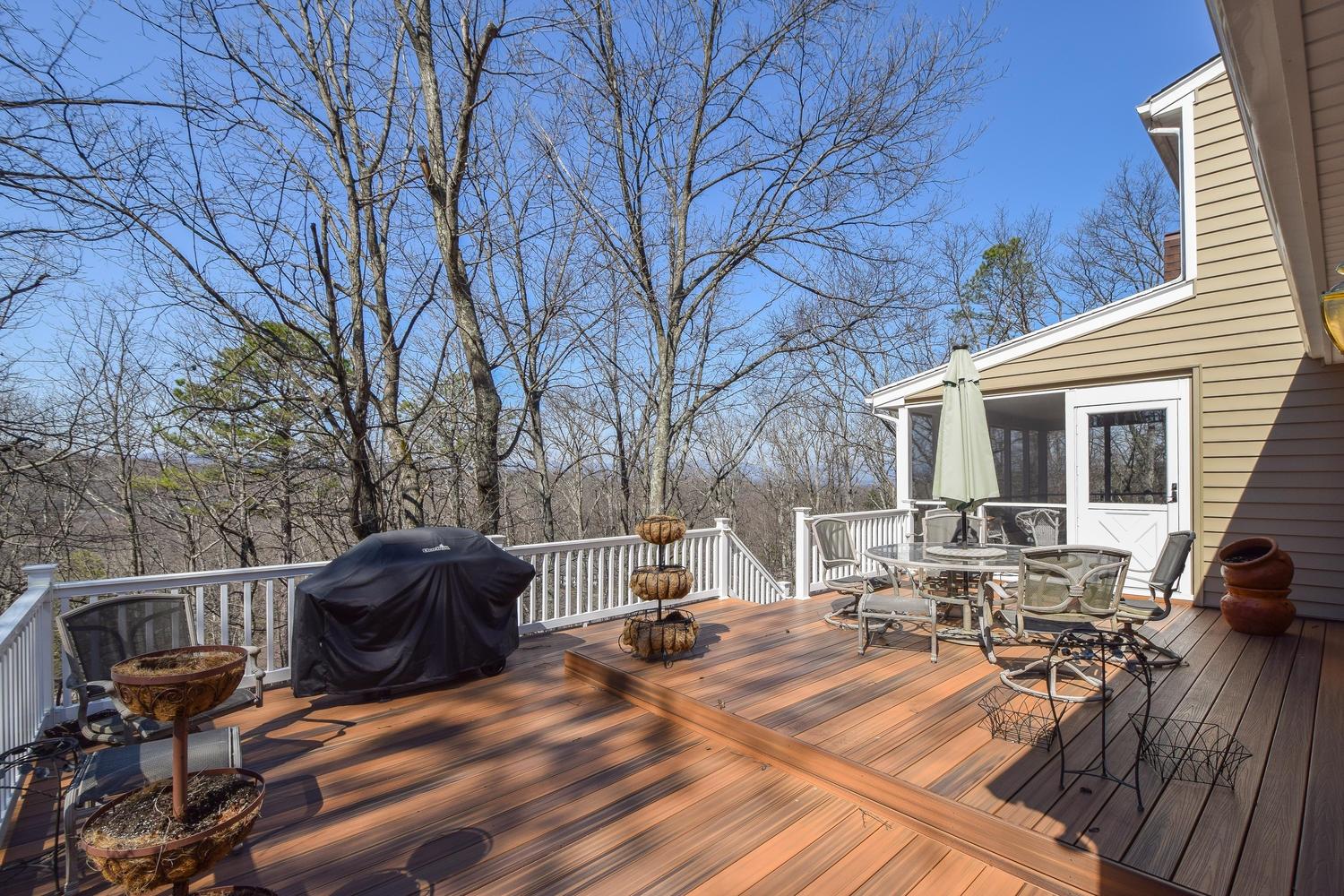 5222 Falcon Ridge Road Roanoke, VA 24018 - Photo 36 of 40 a view of backyard with table and chairs and wooden floor