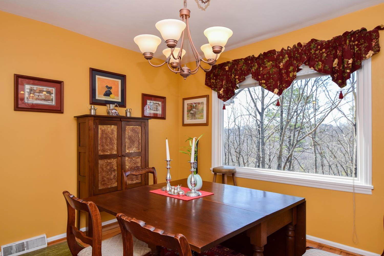 5222 Falcon Ridge Road Roanoke, VA 24018 - Photo 6 of 40 a view of a dining room with furniture and wooden floor