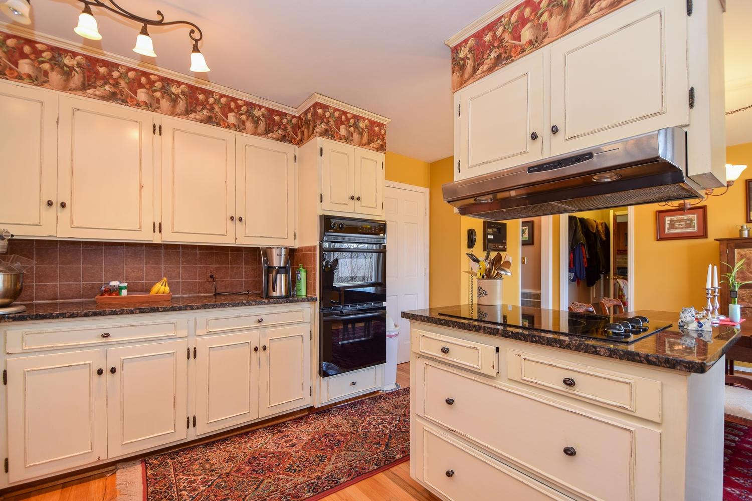 5222 Falcon Ridge Road Roanoke, VA 24018 - Photo 10 of 40 a kitchen with stainless steel appliances granite countertop a refrigerator and cabinets