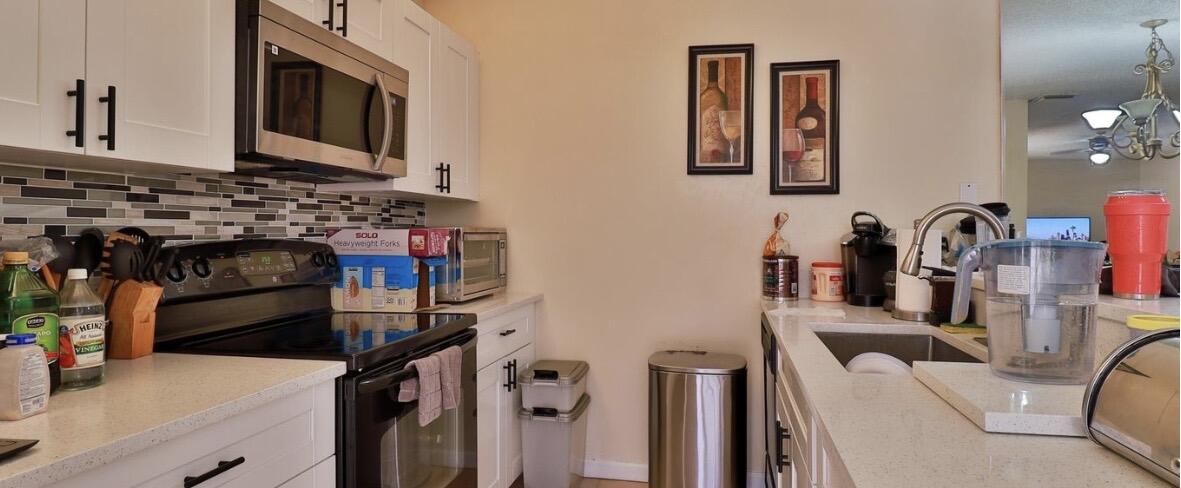 1034 Springdale Circle Palm Springs, FL 33461 - Photo 11 of 16 KITCHEN 4