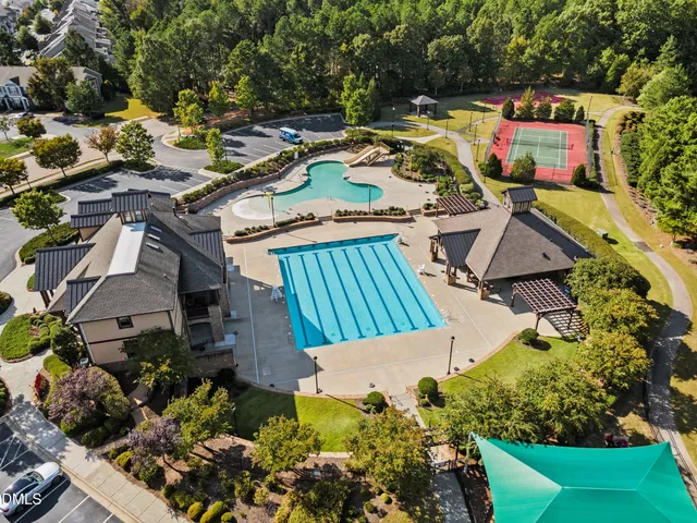 a view of a park with large trees