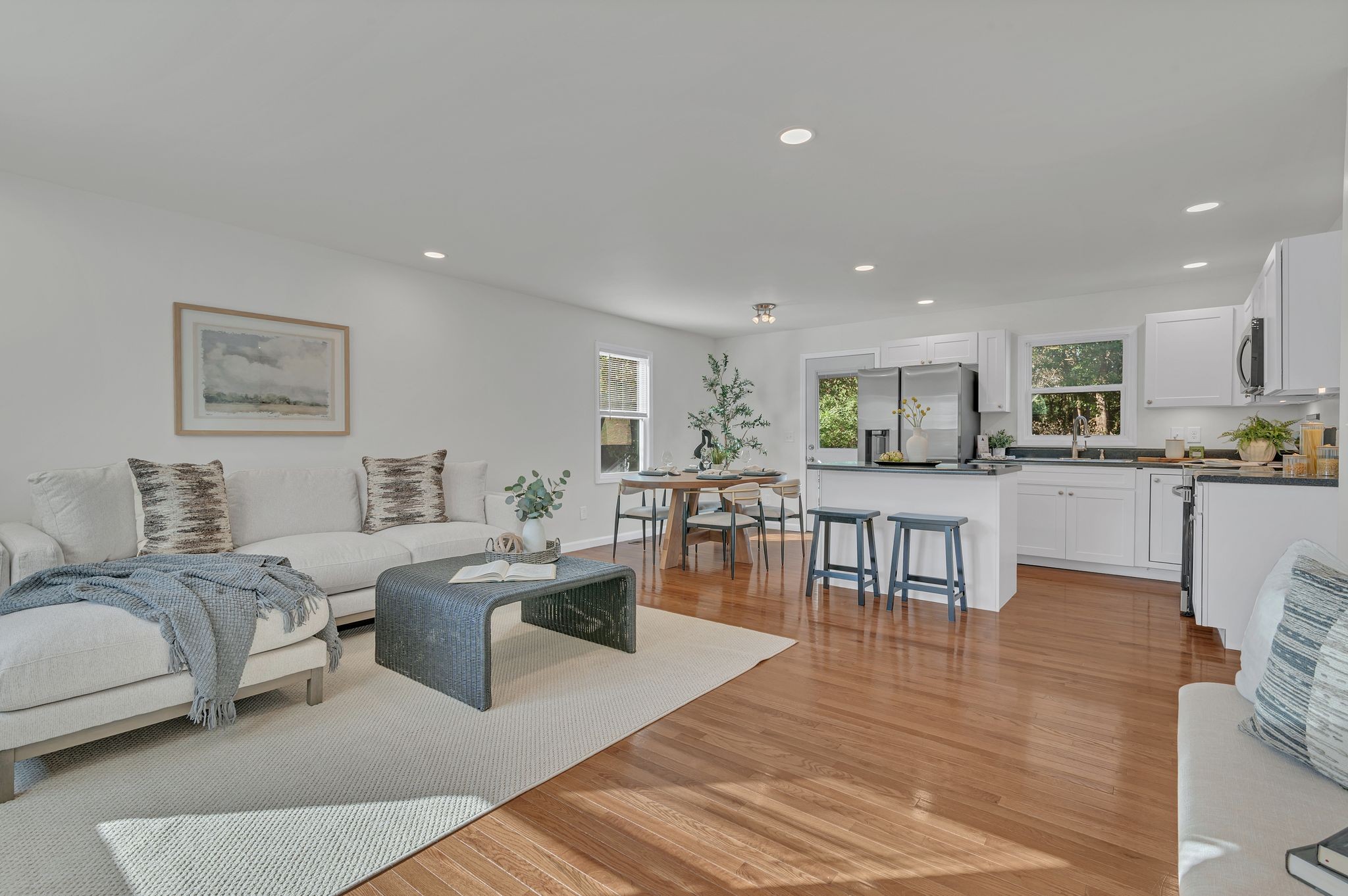 44 Flint Drive Decherd, TN 37324 - Photo 1 of 31 a living room with couches and kitchen view with wooden floor