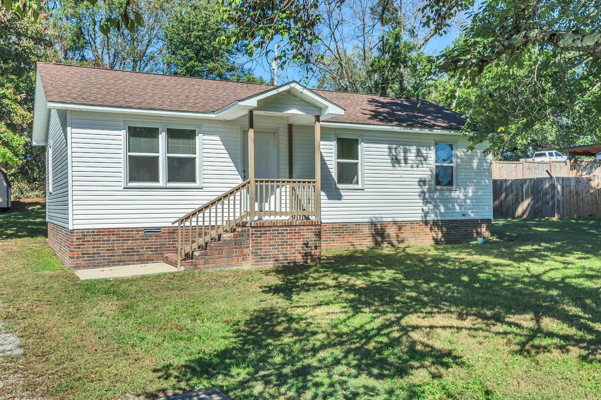 44 Flint Drive Decherd, TN 37324 - Photo 31 of 31 a front view of a house with yard and green space