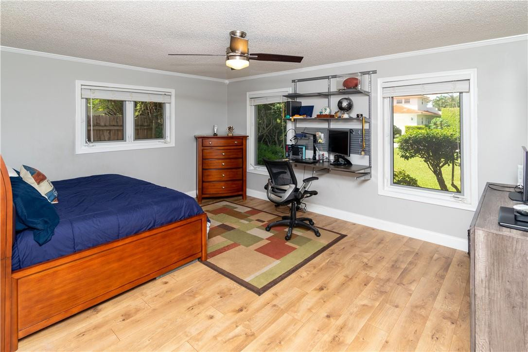 1270 Southwest 19th Street Boca Raton, FL 33486 - Photo 17 of 37 Large Bedroom with Wood Floors