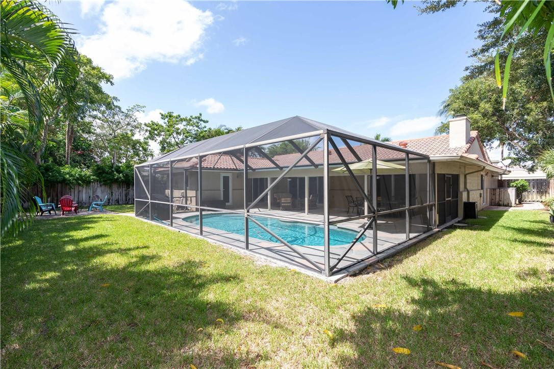 1270 Southwest 19th Street Boca Raton, FL 33486 - Photo 33 of 37 Large yard and screened in pool area