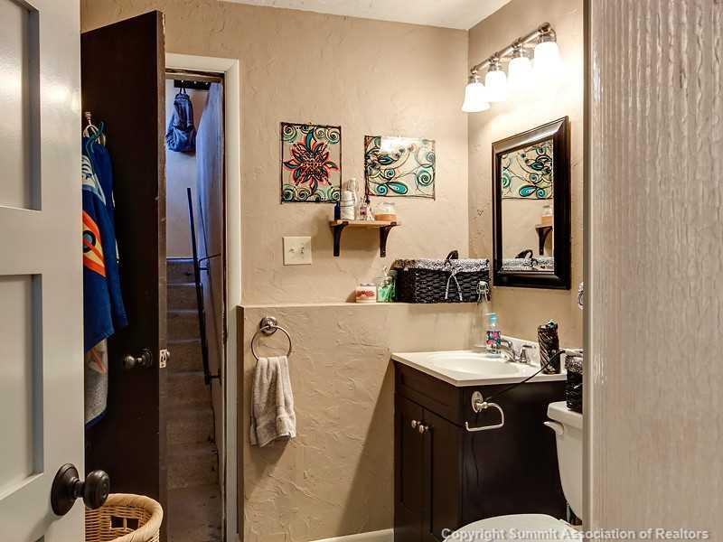 43 Red Feather Road Breckenridge, CO 80424 - Photo 9 of 12 a bathroom with a sink vanity and a mirror