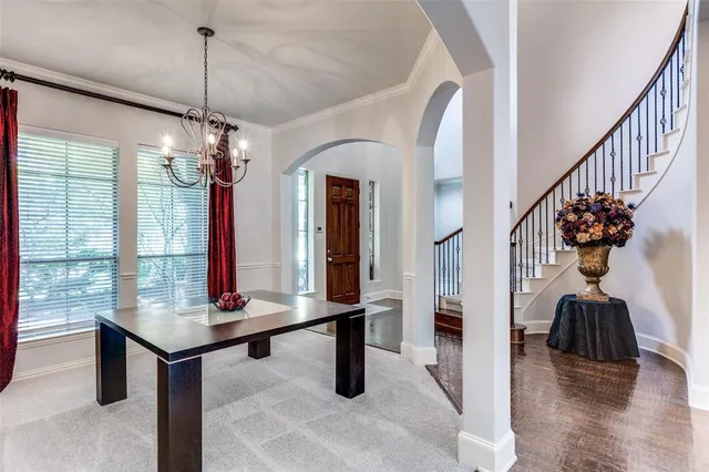 a view of a livingroom with furniture window and wooden floor