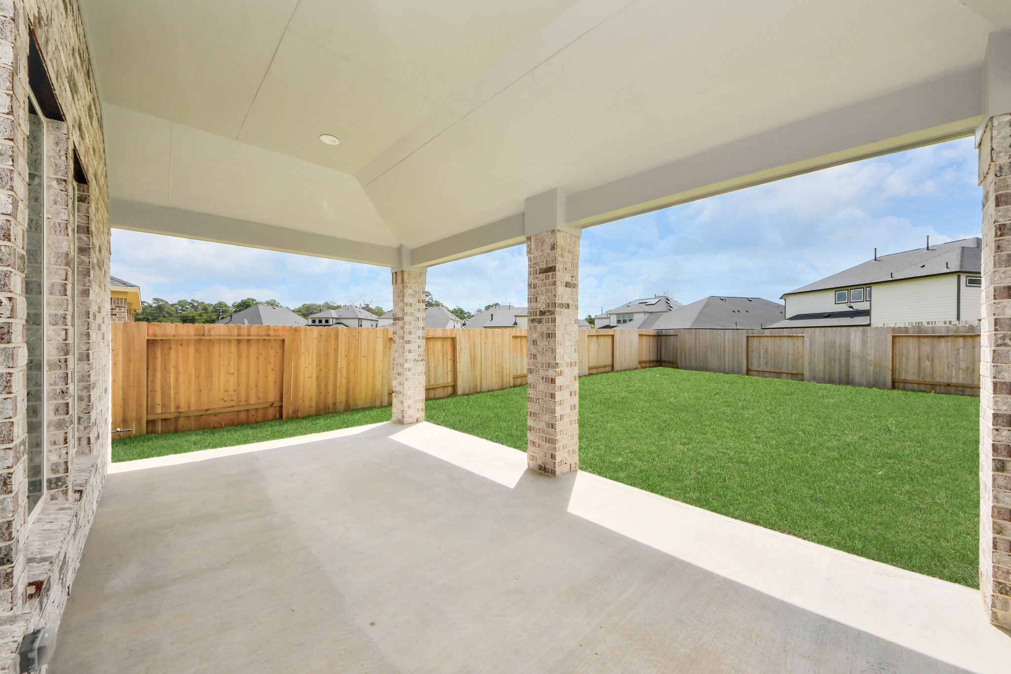 3046 Native Spg Drive Spring, TX 77373 - Photo 6 of 35 Experience outdoor living at its finest on this expansive covered patio, thoughtfully designed for BBQs and delightful outdoor dining.