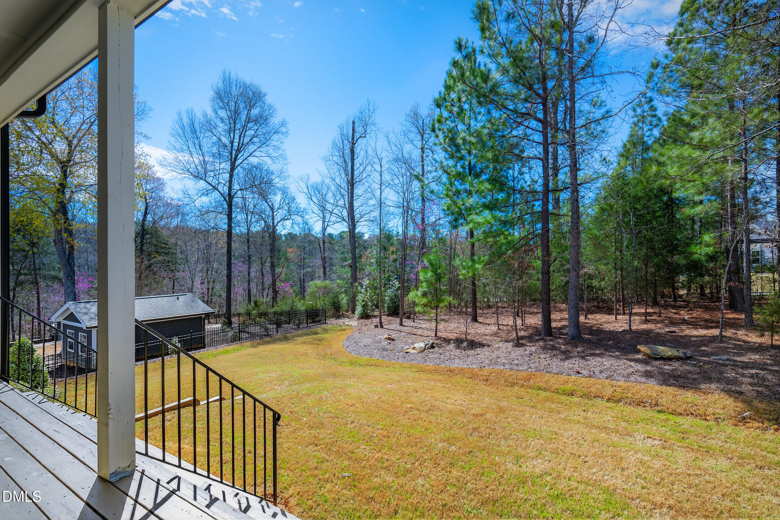 210 Lookout Ridge Pittsboro, NC 27312 - Photo 56 of 59 a view of a swimming pool with a patio and wooden fence