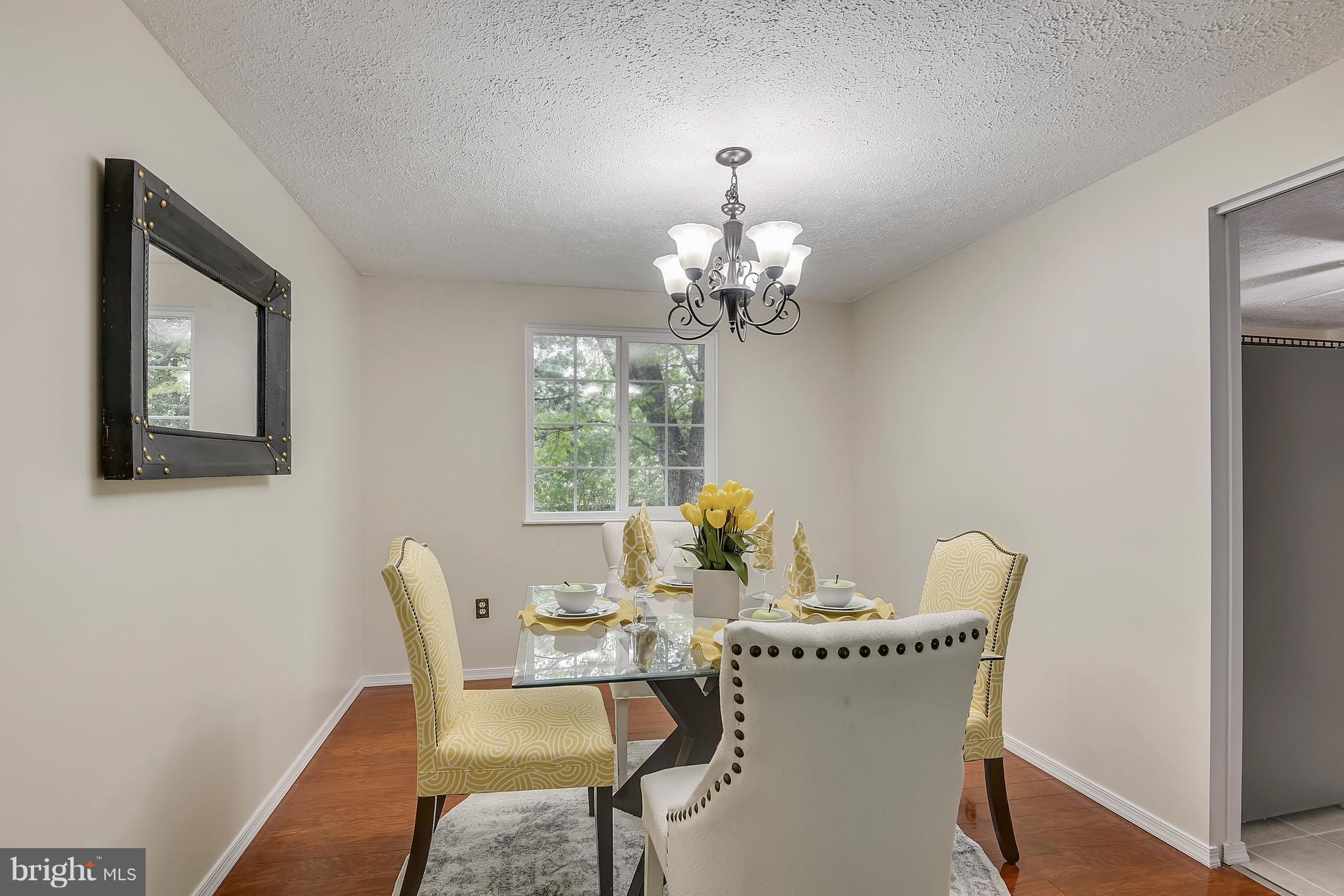 415 Rock Lodge Road Gaithersburg, MD 20877 - Photo 11 of 30 Dining Room offers hardwood flooring