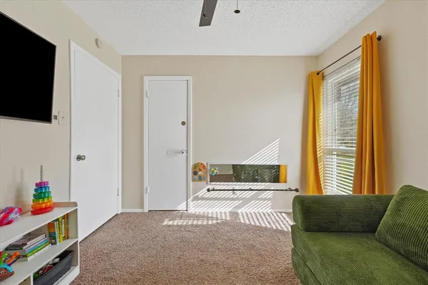 a backyard of a house with outdoor seating