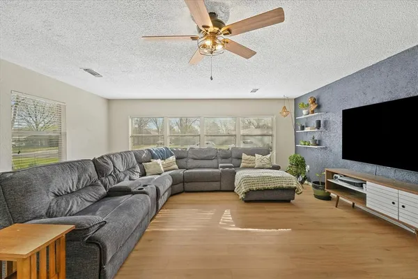 a kitchen with stainless steel appliances granite countertop a stove and a sink