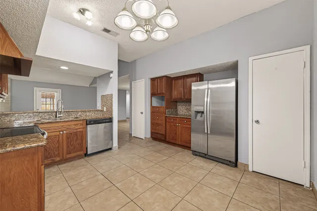 $254,000 | 11911 Green Glade Drive, Houston, TX 77099