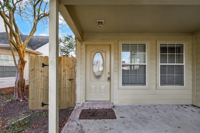 a front view of a house with a porch