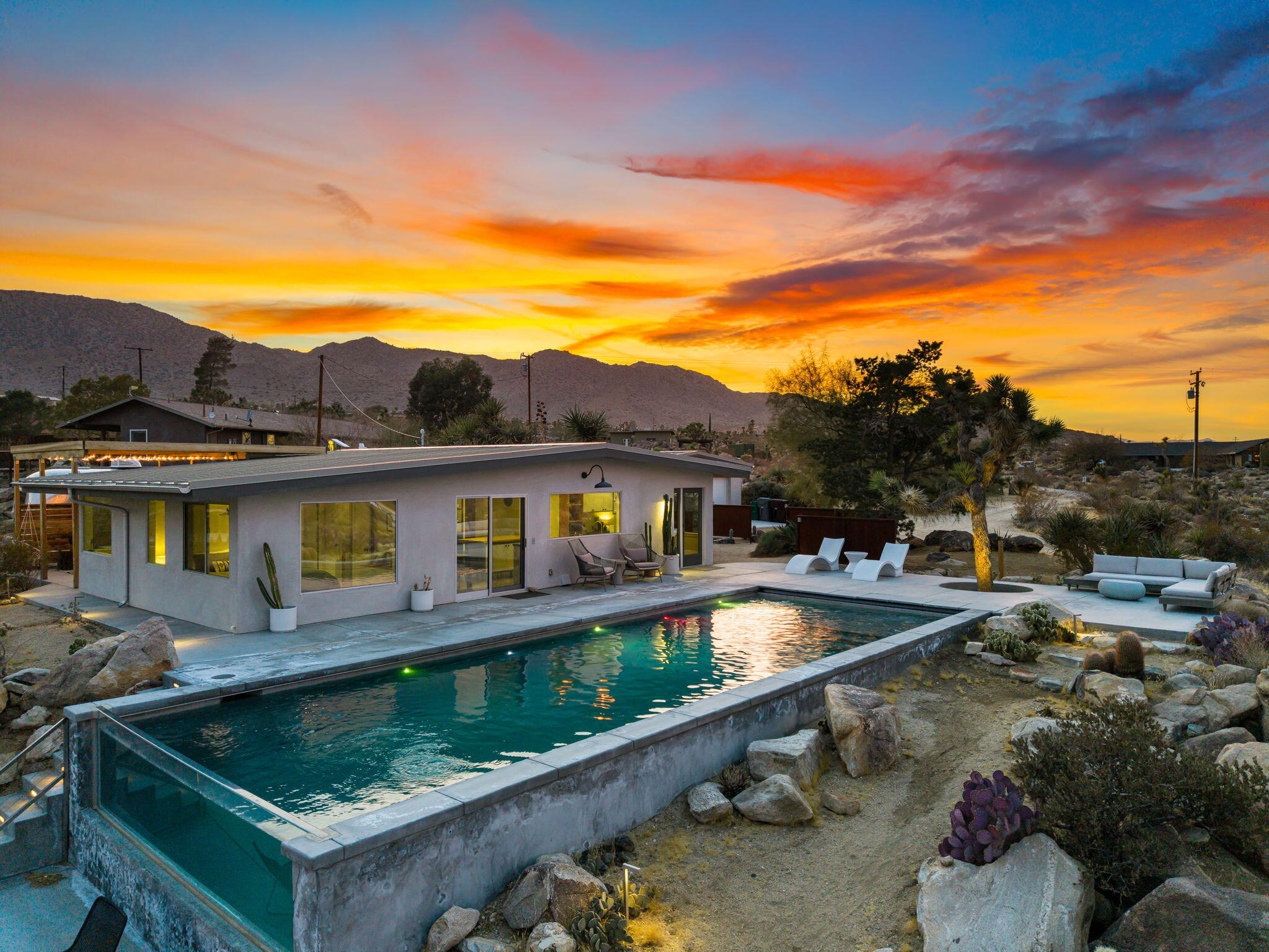 8269 Vía Rocosa Joshua Tree, CA 92252 - Photo 46 of 74 a view of balcony with two and potted plants