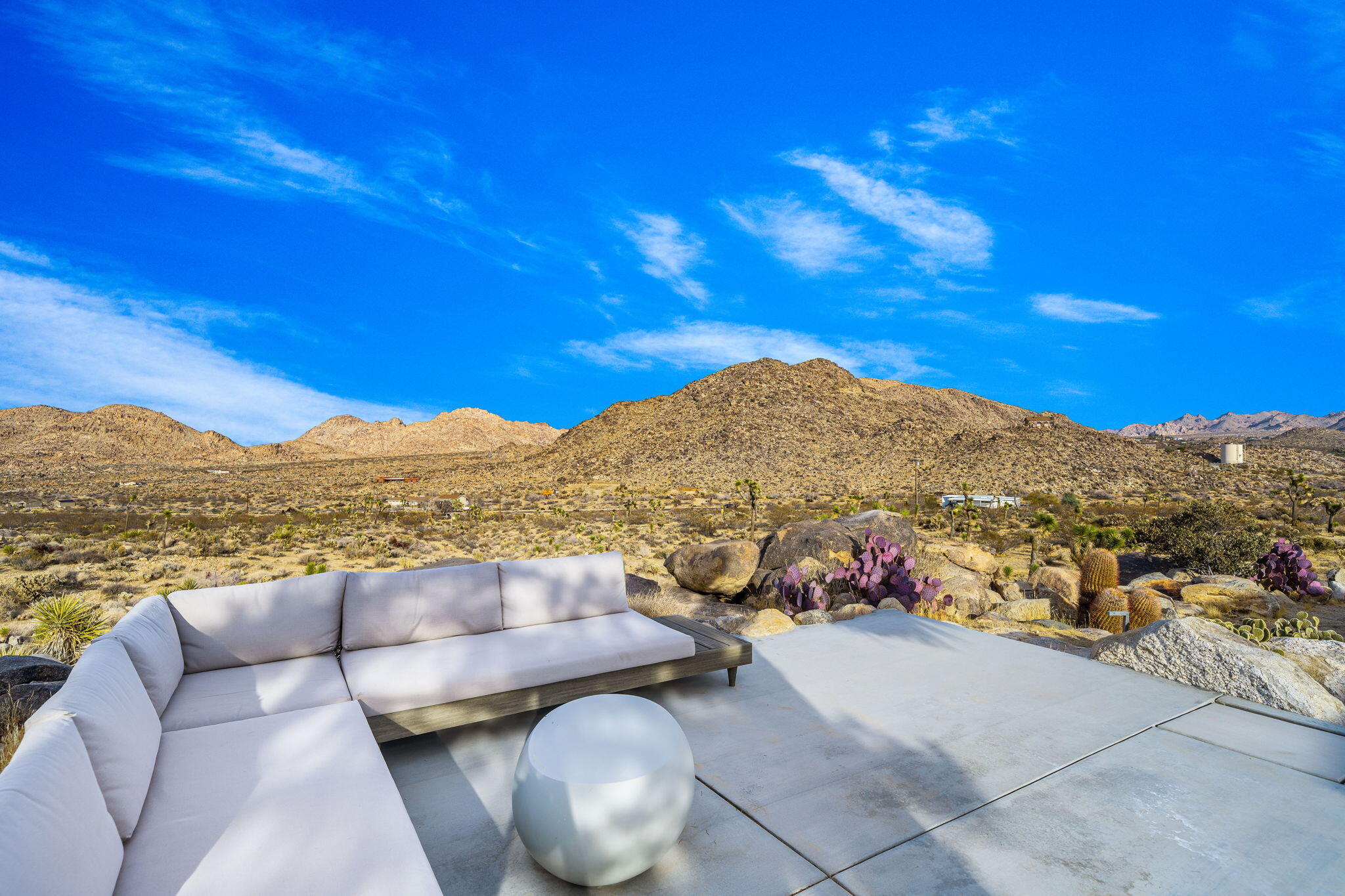 8269 Vía Rocosa Joshua Tree, CA 92252 - Photo 53 of 74 a view of a terrace with a couch