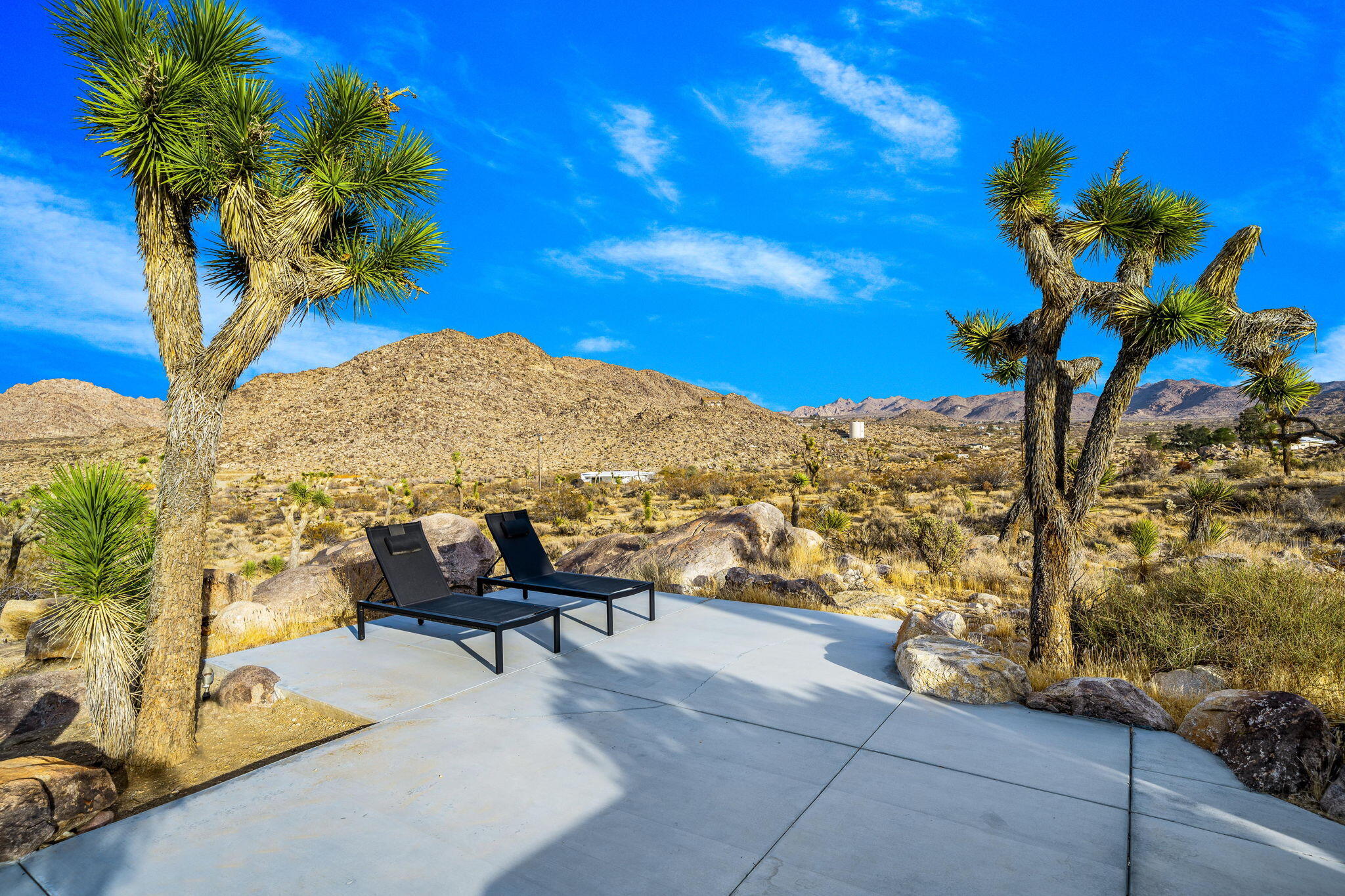 8269 Vía Rocosa Joshua Tree, CA 92252 - Photo 60 of 74 a view of a terrace with furniture