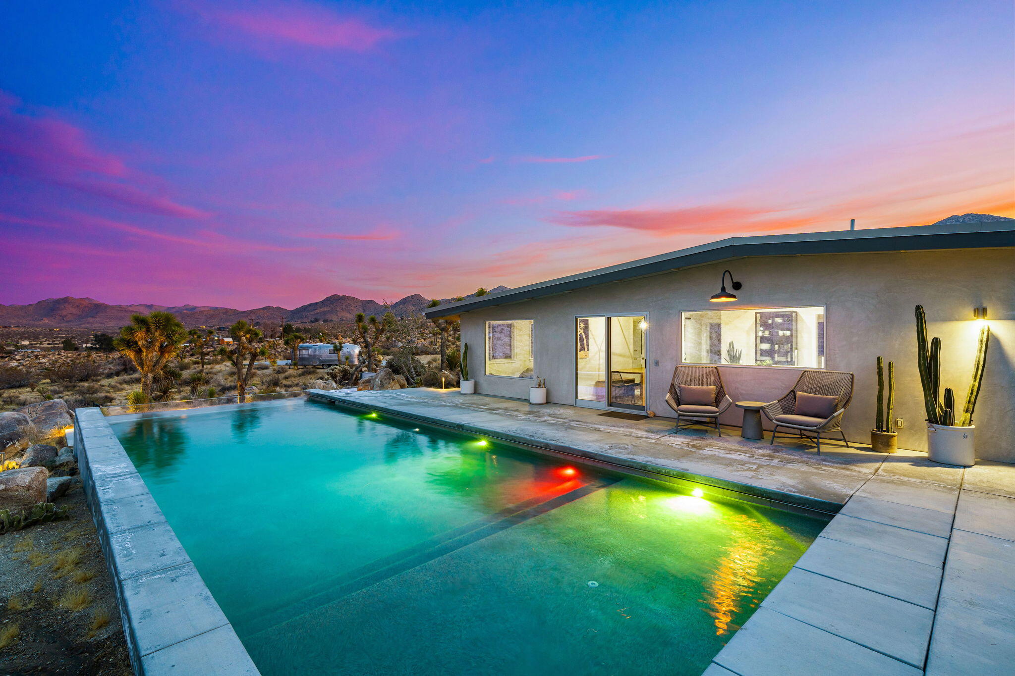8269 Vía Rocosa Joshua Tree, CA 92252 - Photo 66 of 74 a view of swimming pool with seating area and furniture