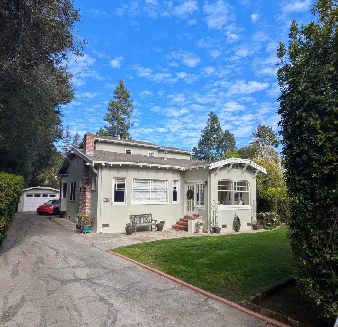 113 Middlefield Road Atherton, CA 94027 - Photo 1 of 2 a front view of a house with a garden